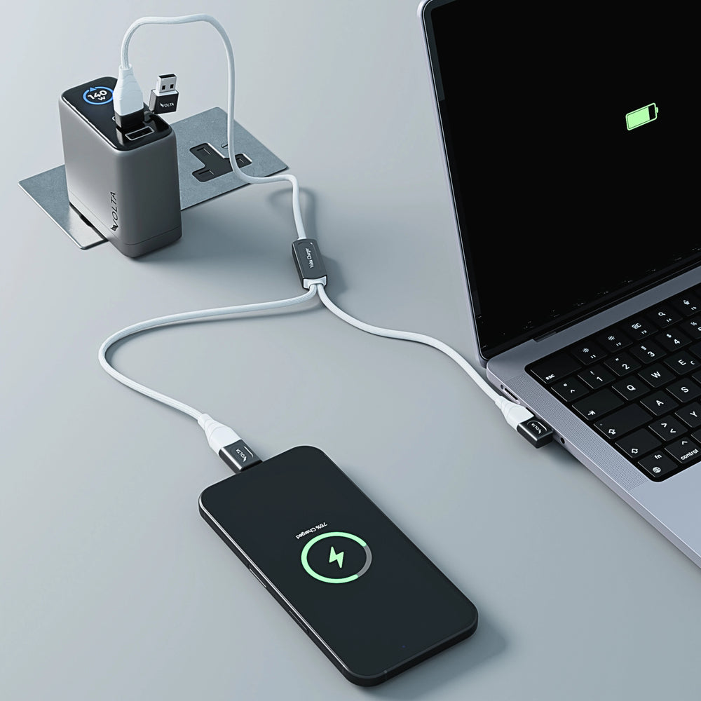 Volta MAX Lite dual magnetic cable charging phone and earbuds on desk